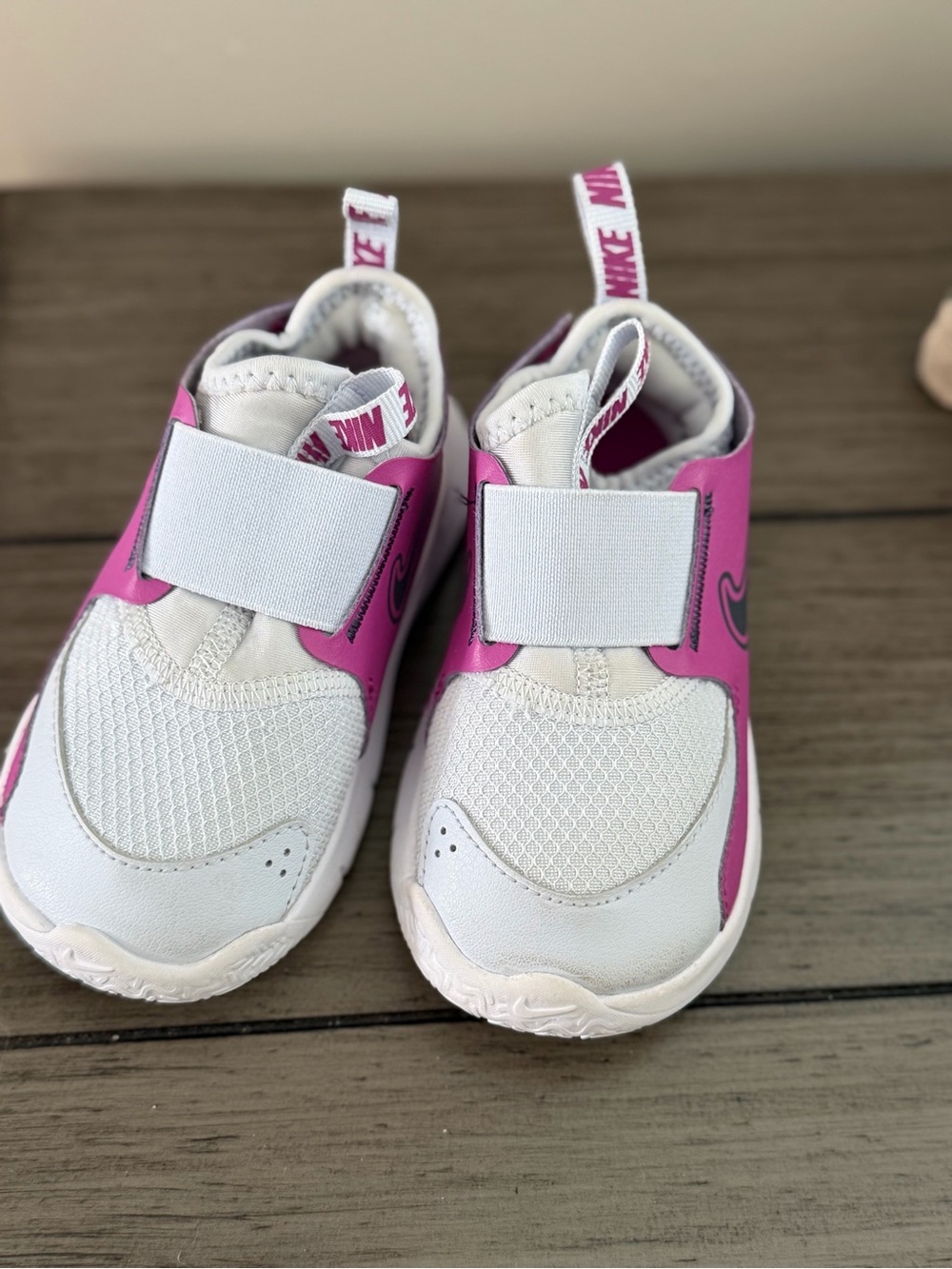 Nike Kids White and Pink Slip-On Sneakers